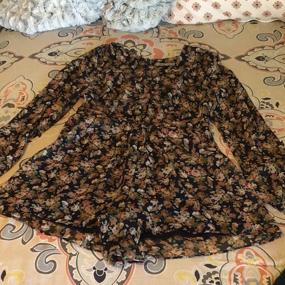 Floral Foreign Exchange romper!